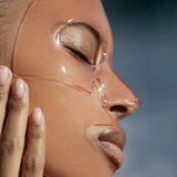JONES + CO hydrating collagen gel mask on a model's face to soothe and refresh sun-damaged skin.
