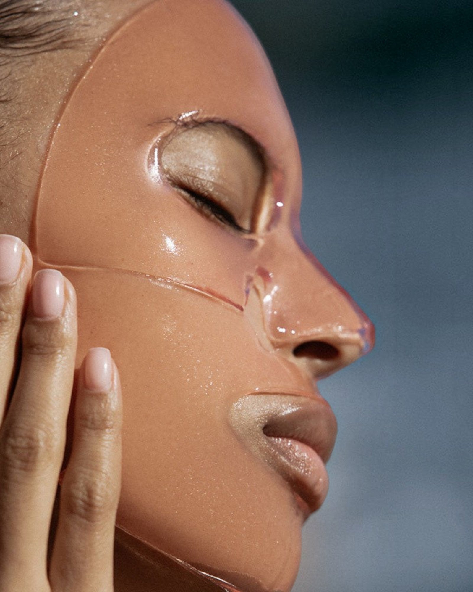 JONES + CO hydrating collagen gel mask on a model's face to soothe and refresh sun-damaged skin.