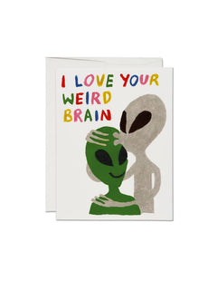 JONES + CO Alien Love Card featuring two aliens and the text I LOVE YOUR WEIRD BRAIN in colorful hand-drawn letters.