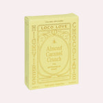 JONES + CO Almond Caramel Crunch chocolate bar box in pale yellow packaging with gold text and botanical details.