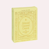 JONES + CO Almond Caramel Crunch chocolate bar box in pale yellow packaging with gold text and botanical details.