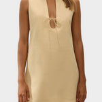 JONES + CO Alondra mini dress in daffodil yellow featuring a sleeveless design, deep V-neck, and front tie detail.