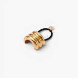 JONES + CO Anya Mini Pony Cuff in gold with a black elastic band for braids and ponytails.