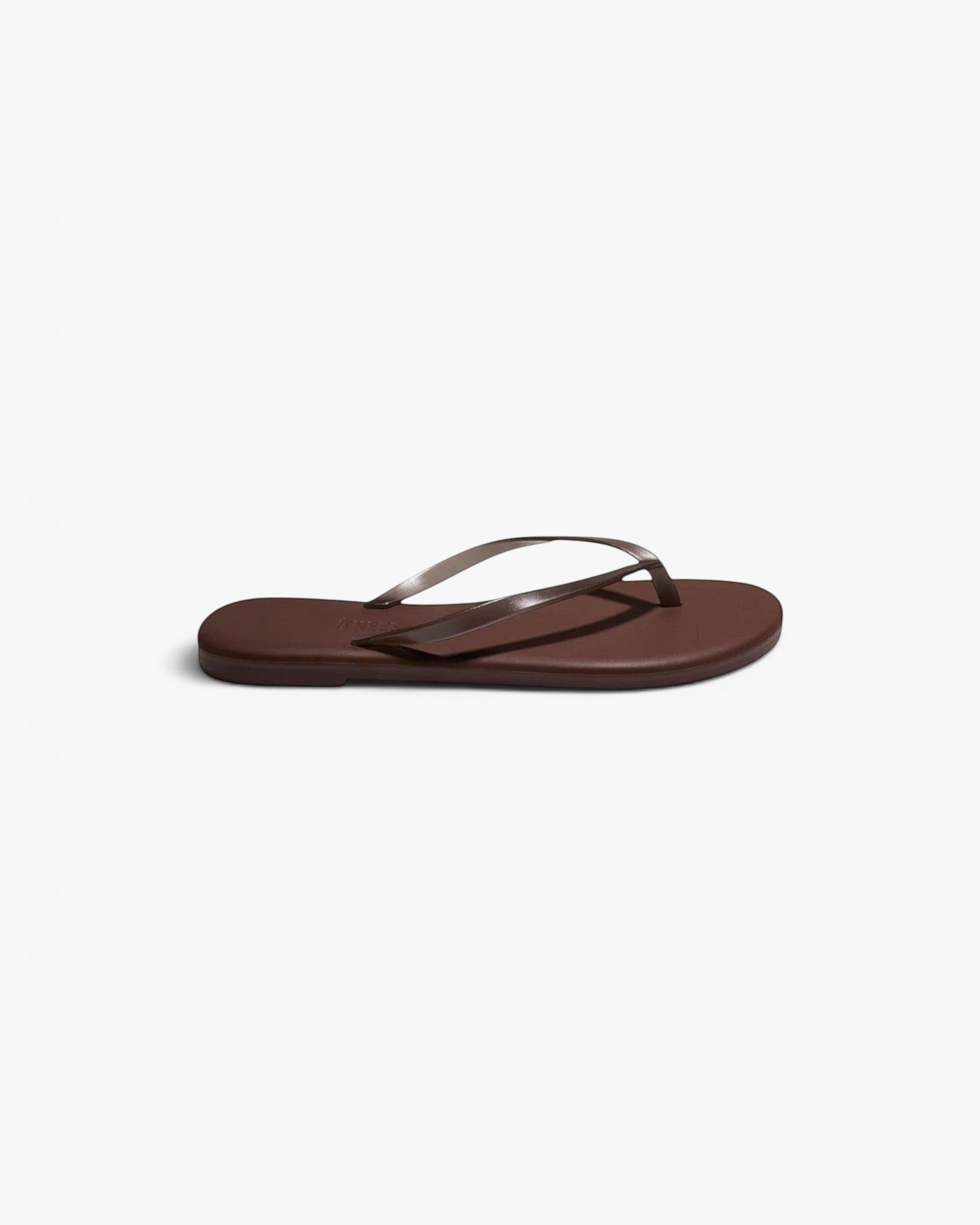 JONES + CO Aqua Flip-Flop Sandal in brown, featuring a minimal waterproof design for beach and summer wear.