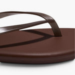 JONES + CO brown waterproof Aqua Lily flip-flop sandal with a minimal design for beach and summer wear.
