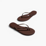JONES + CO Aqua Lily waterproof brown flip-flop sandals with a minimal design for beach and summer wear.