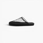 JONES + CO black Mesh Baboosh Mule featuring breathable netted mesh upper and neoprene trim in a slip-on silhouette.