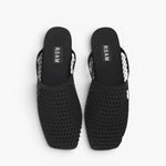JONES + CO ROAM black mesh baboosh mules with breathable netted construction and neoprene trim.