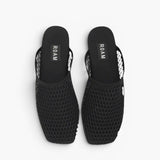 JONES + CO ROAM black mesh baboosh mules with breathable netted construction and neoprene trim.