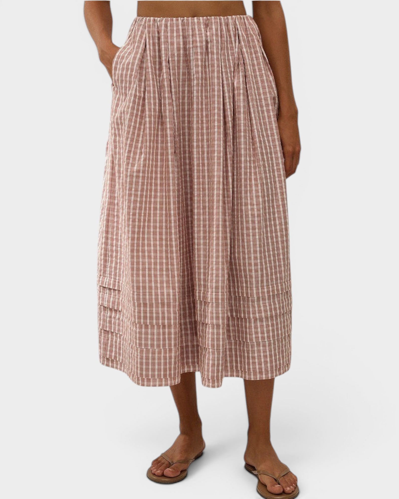 JONES + CO Cales midi skirt in cinnamon and white check cotton with elastic waist and pin tuck hem detail.