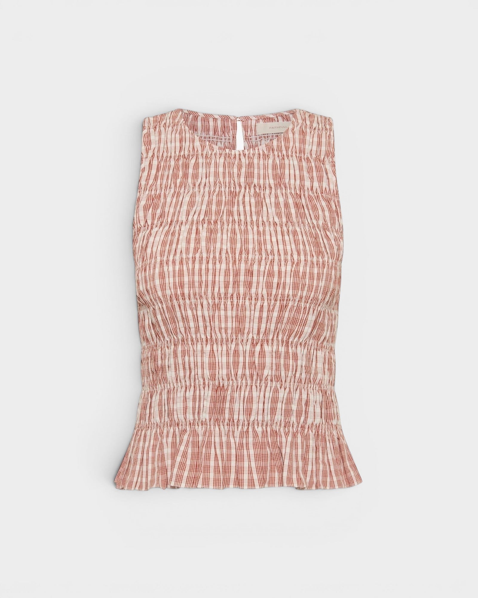 JONES + CO Cales Top in Cinnamon White check cotton with a shirred bodice and peplum frill hem.