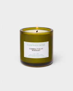 JONES + CO Climbing Tuscan Rosemary scented candle in a green glass jar with a white label.