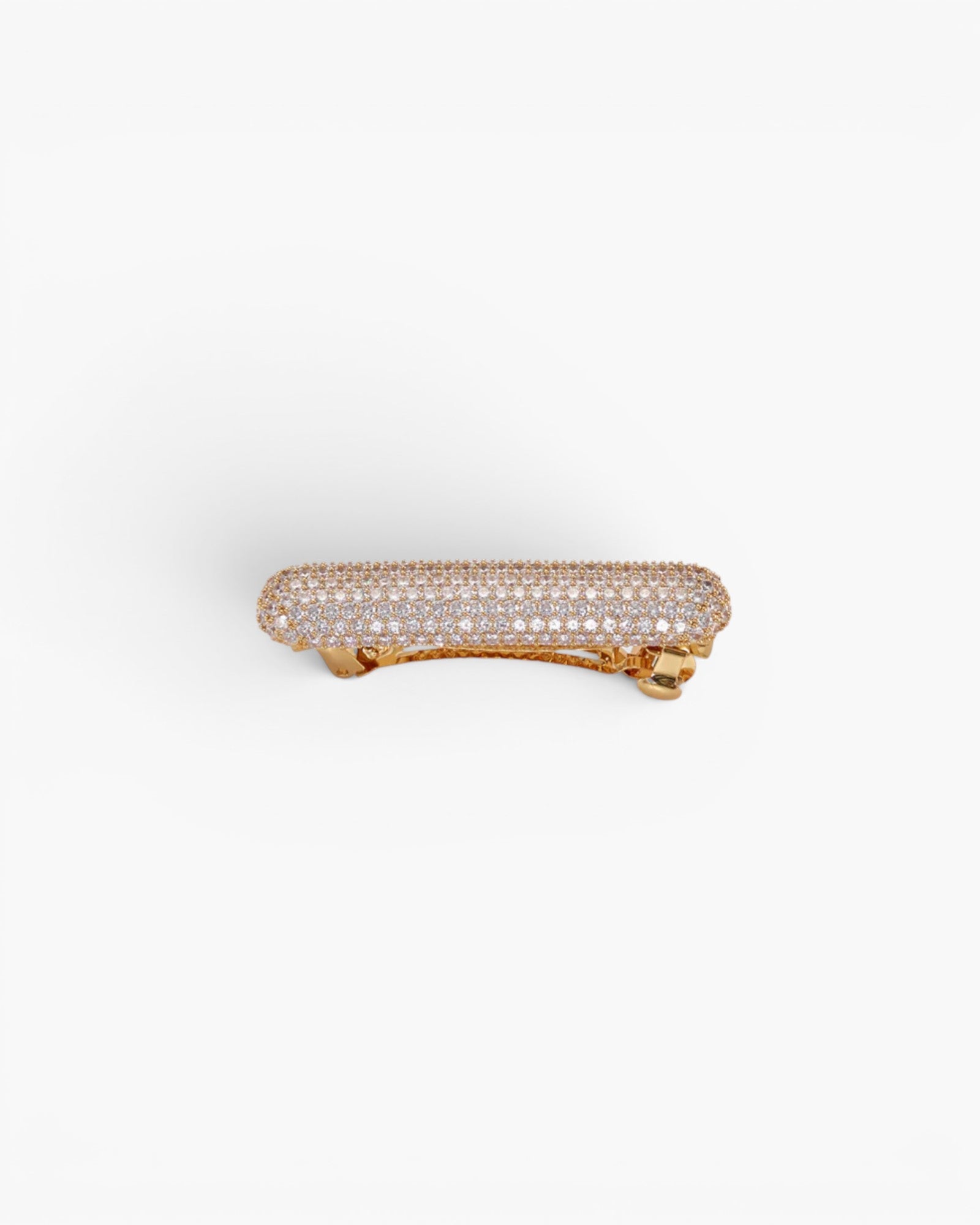 JONES + CO Crystal Pave Bar Barrette in gold with sparkling crystals, featuring a secure French barrette clasp.