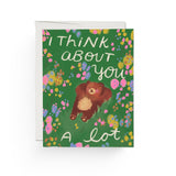 JONES + CO Daydreaming Card featuring a brown bear illustration on a green floral background with hand-lettered text.