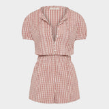 JONES + CO Emilie playsuit in cinnamon and white Paloma check print with puff sleeves and button-down front.