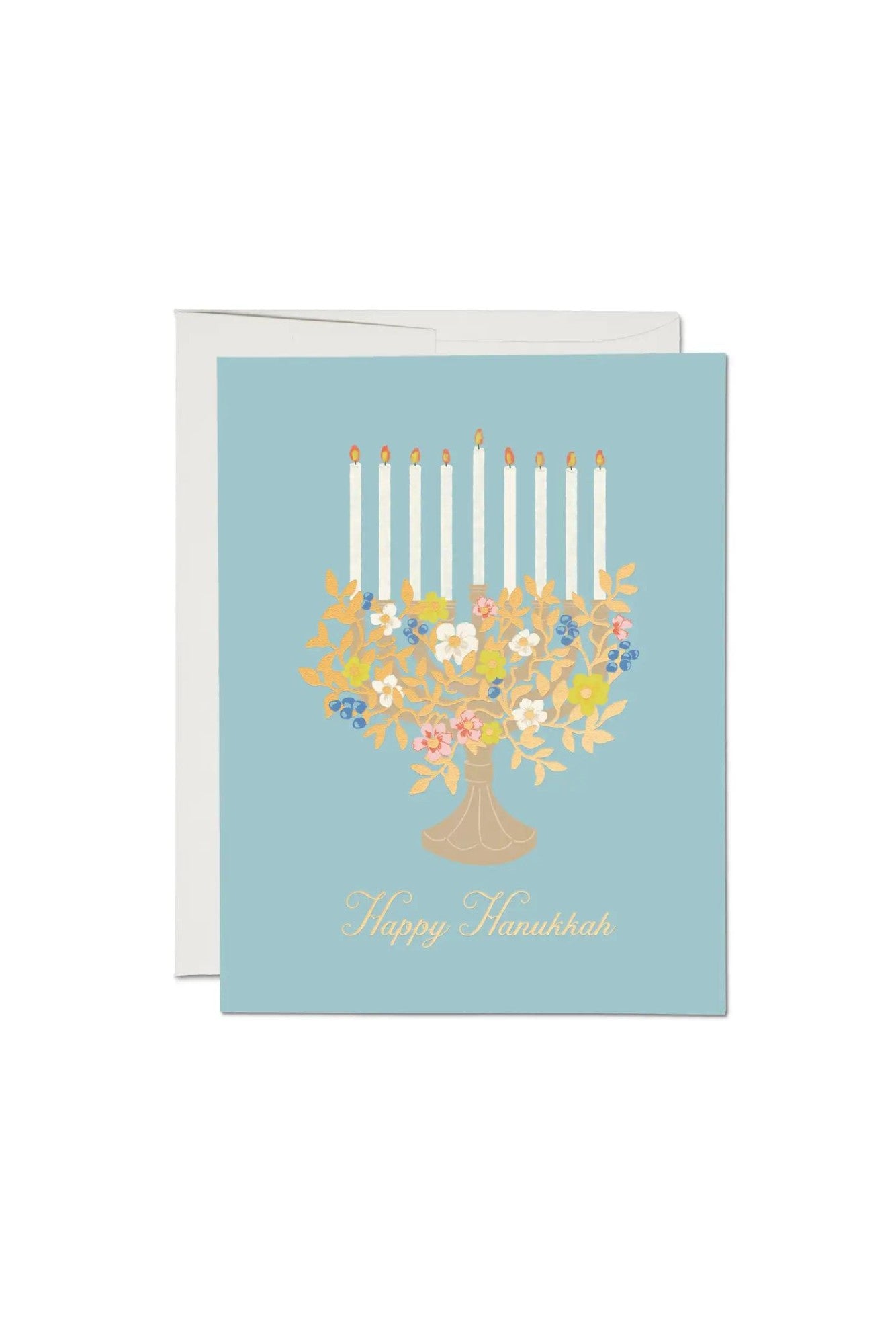 JONES + CO Floral Menorah Hanukkah card on light blue paper with illustrated flowers and candles