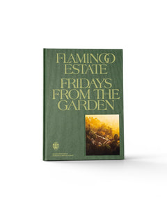 JONES + CO Fridays From the Garden cookbook with green linen cover and Flamingo Estate garden photography.