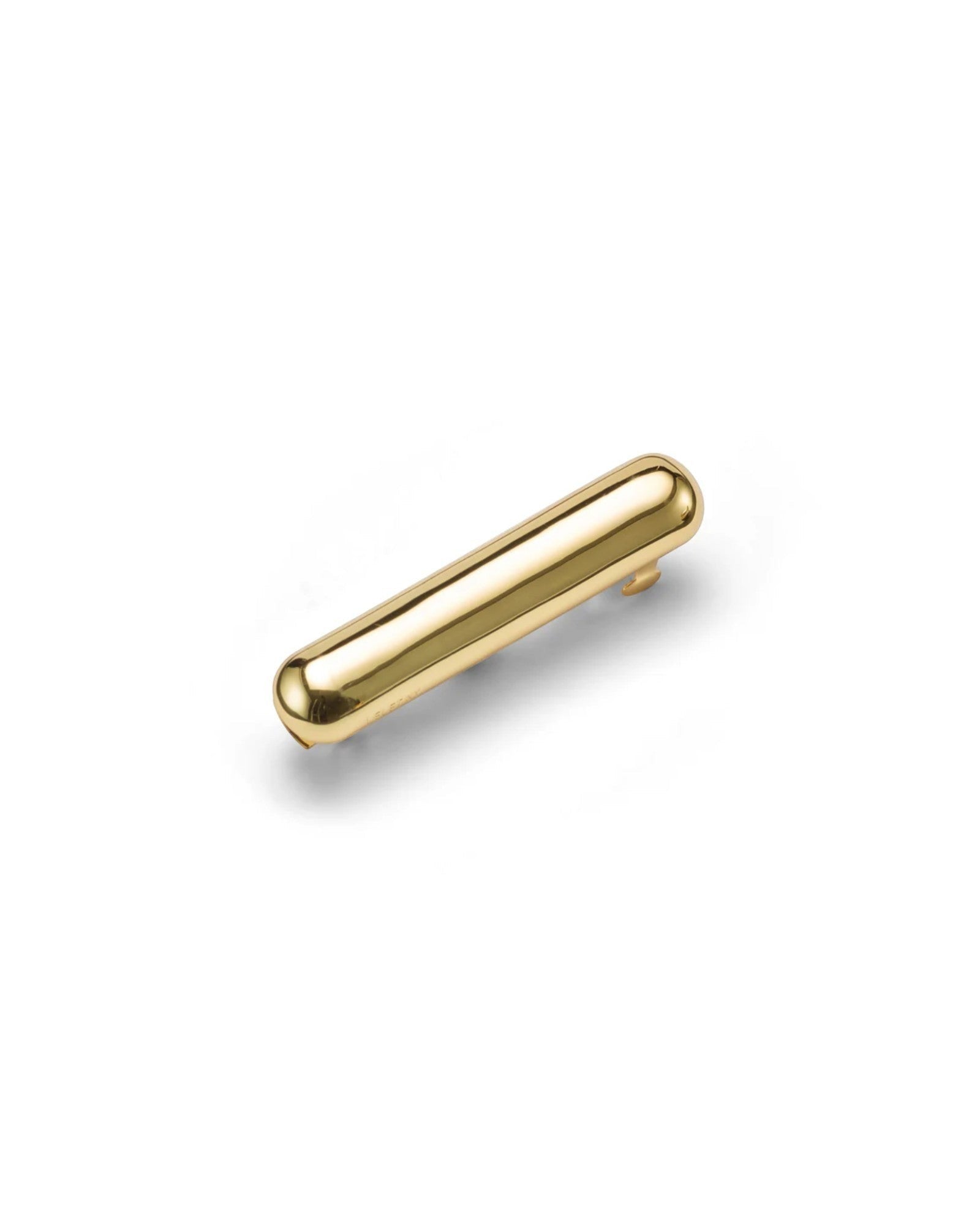 JONES + CO gold Glossy Bar Barrette with a sleek domed elongated silhouette and secure french clip backing.