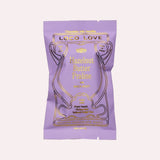 JONES + CO Loco Love hazelnut butter praline chocolate bar with maca root in a light purple wrapper