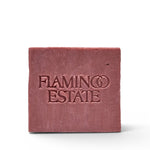 JONES + CO Jasmine & Damask Rose soap brick in a dusty rose color with embossed branding on a white background.