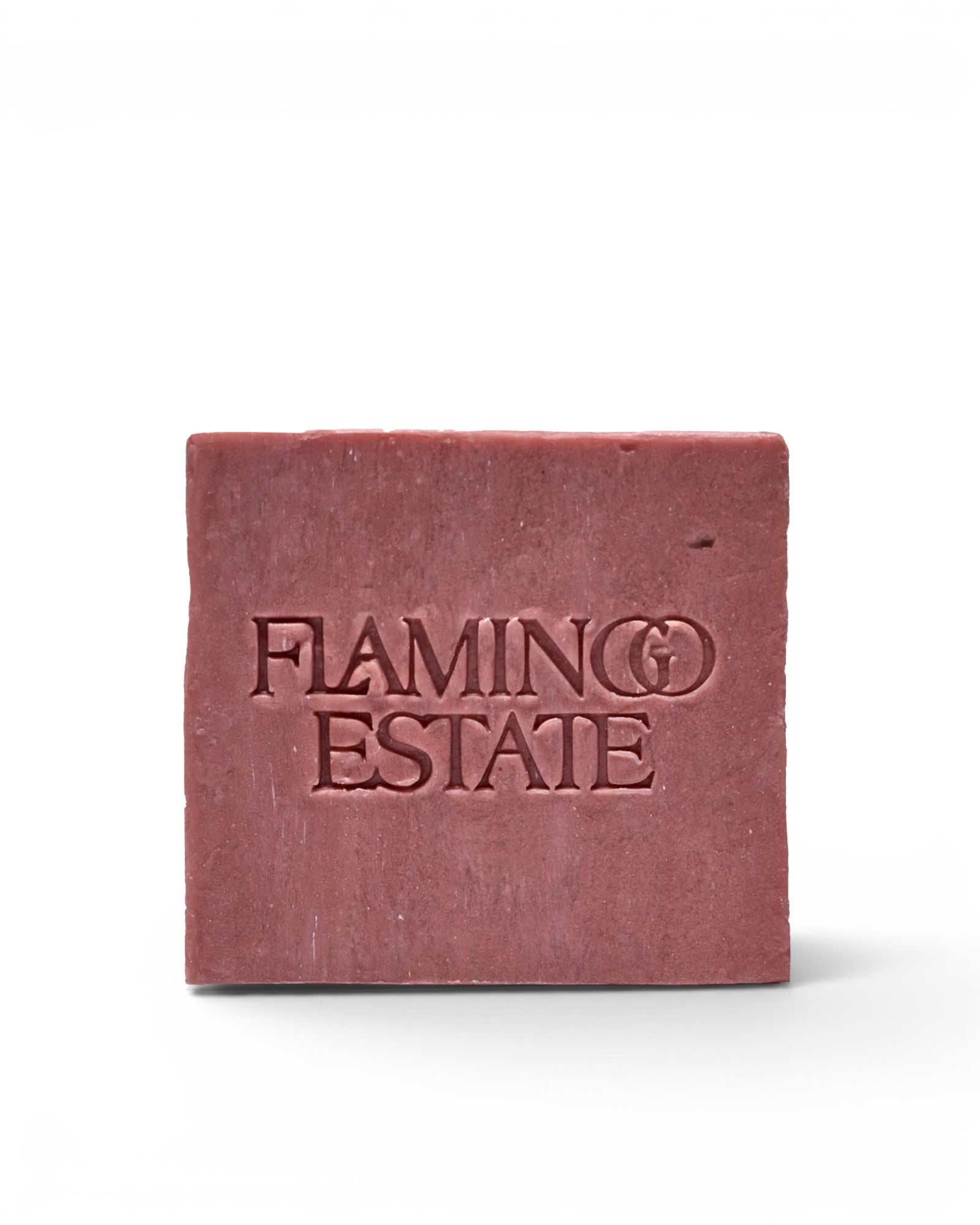 JONES + CO Jasmine & Damask Rose soap brick in a dusty rose color with embossed branding on a white background.