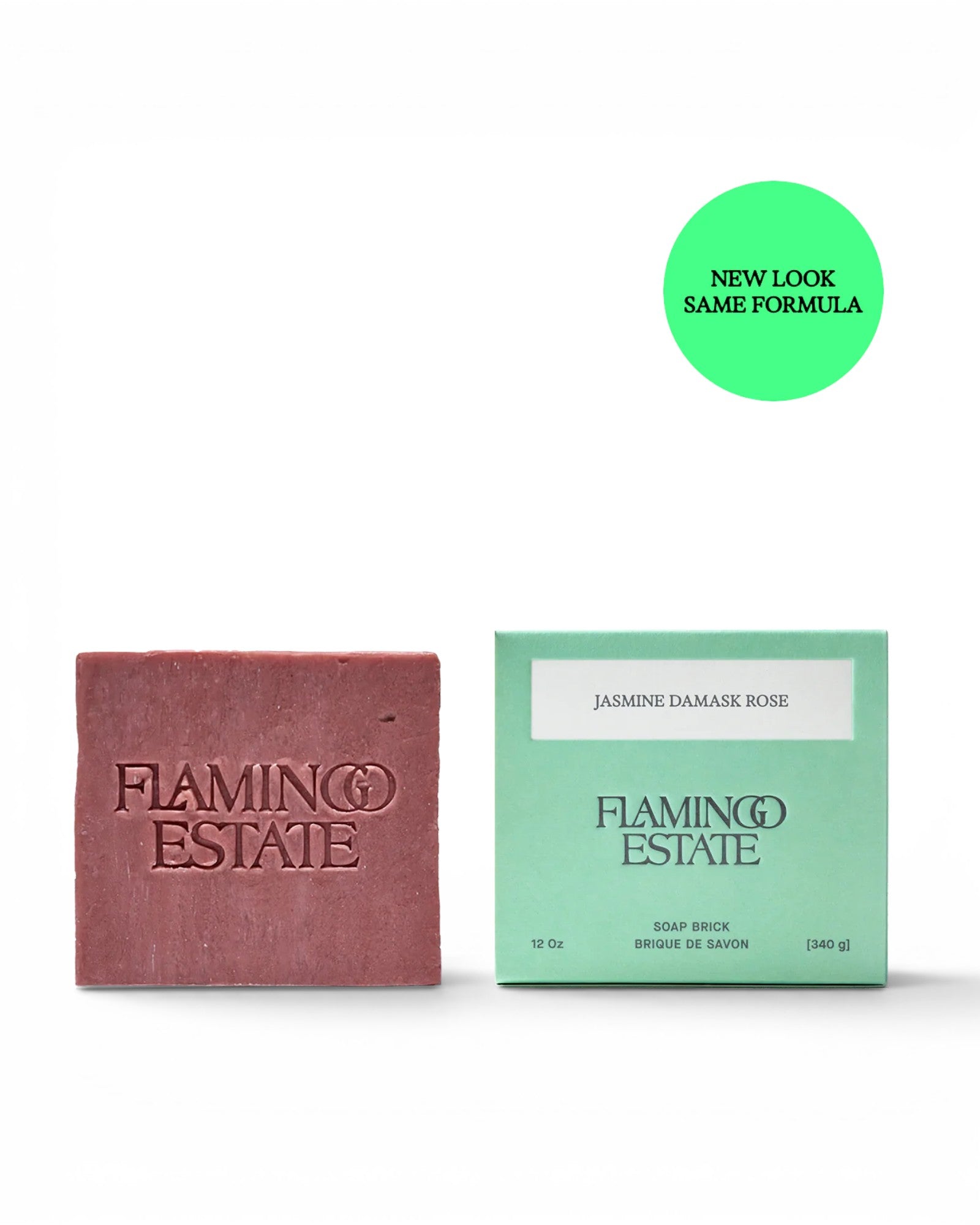 JONES + CO Jasmine & Damask Rose soap brick with embossed logo next to its mint green packaging box.