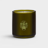 JONES + CO Night Blooming Jasmine & Damask Rose scented candle in a dark olive green glass vessel with logo.