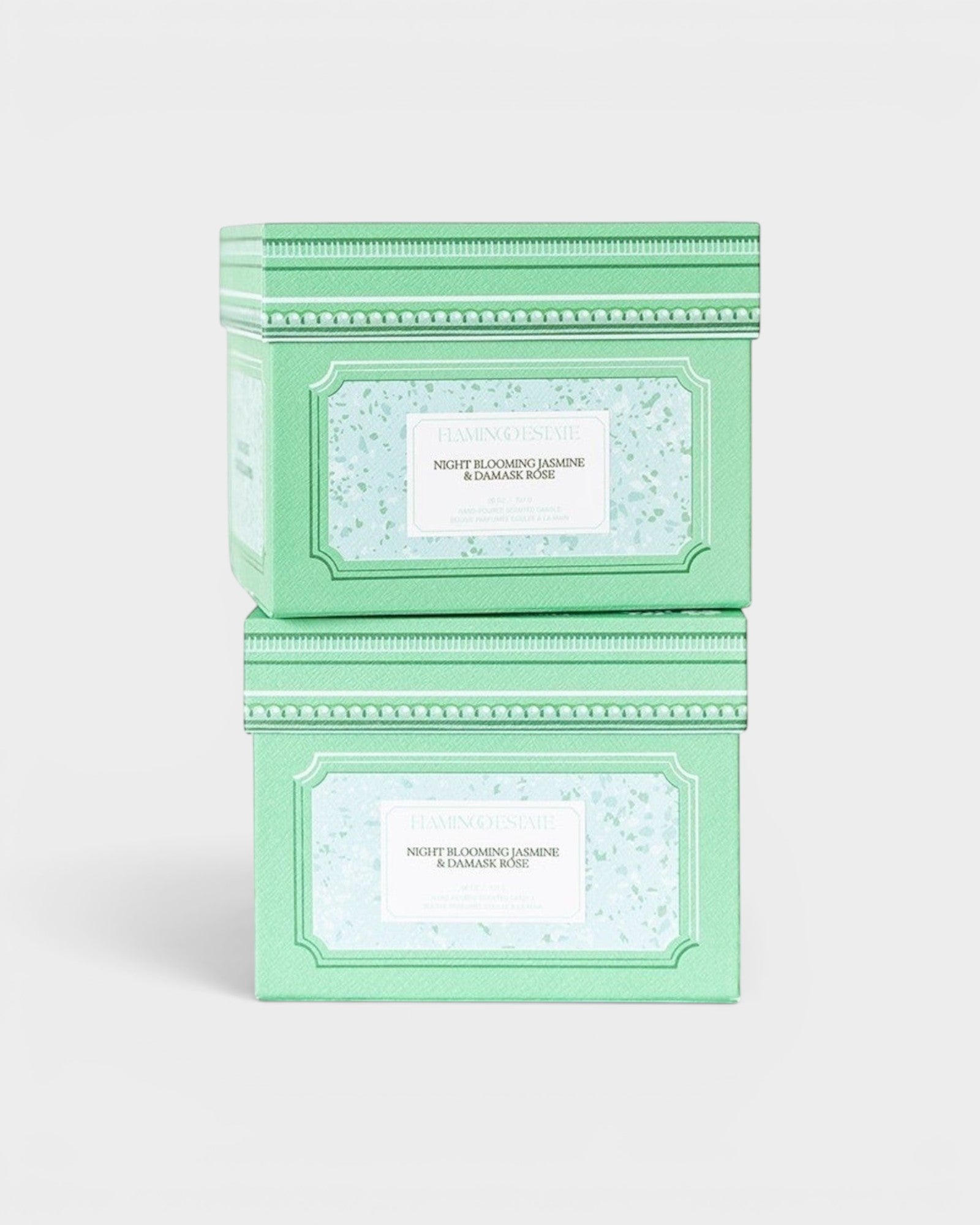 JONES + CO Night Blooming Jasmine & Damask Rose XL candle in a stacked mint green decorative gift box.