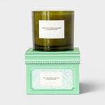 JONES + CO Night Blooming Jasmine & Damask Rose XL candle in a dark green glass jar with a decorative mint green box.