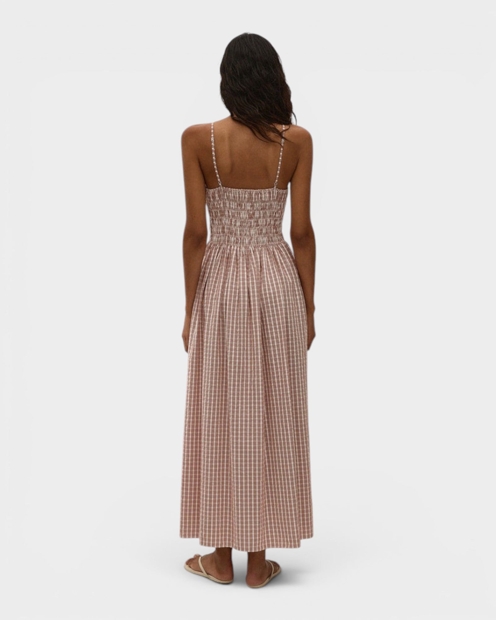 JONES + CO Laia maxi dress in cinnamon and white checkered cotton with a shirred bodice and thin adjustable straps.