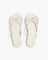 JONES + CO Lily cream leather flip flop sandals featuring an oversized bow detail and cushioned insole.