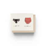 JONES + CO greeting card featuring illustrations of black lace underwear and red granny panties with romantic text.