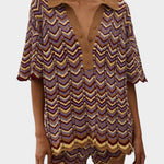 JONES + CO Luis Polo Top in Ramona stripe featuring a chevron knit pattern with brown, yellow, and purple tones.