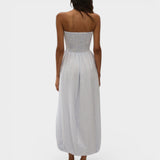 JONES + CO Lunaire strapless midi dress in light blue stripe cotton with a shirred bodice and bubble hem silhouette.