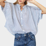 Model wearing a JONES + CO organic cotton blue indigo striped top with mandarin collar and batwing sleeves.