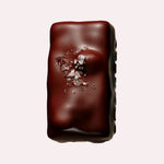 JONES + CO dark chocolate caramel bar topped with Tasmanian sea salt and maple roasted macadamias