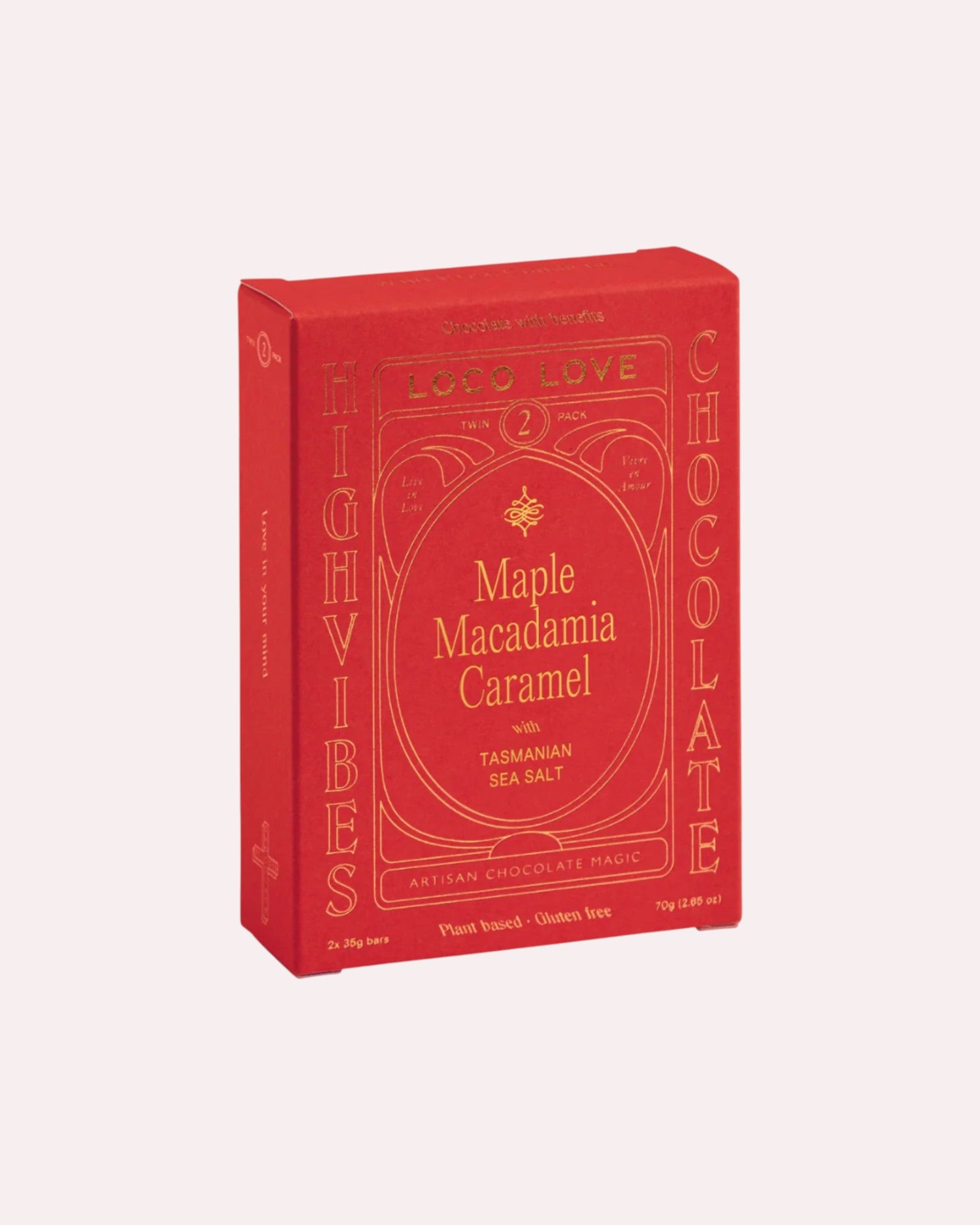 JONES + CO Loco Love Maple Macadamia Caramel chocolate bar box in red packaging with gold lettering.