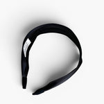 JONES + CO Olivia Headband in ebony black with a sleek fabric finish and comfortable suede-lined ends.