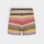 JONES + CO Raya high-rise knit mini shorts in a multi-color Perla stripe pattern with a ribbed waist and zig zag hem.