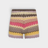 JONES + CO Raya high-rise knit mini shorts in a multi-color Perla stripe pattern with a ribbed waist and zig zag hem.