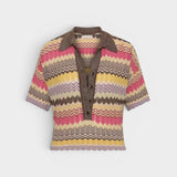 JONES + CO Raya Polo Top in Perla Stripe featuring a multi-colour zig zag knit, collar, and button-up placket.