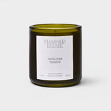 JONES + CO Flamingo Estate Roma Heirloom Tomato scented candle in a dark green glass jar with a white label.
