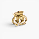 JONES + CO Selene gold stainless steel claw clip with elegant curved lines for a sophisticated hair accessory look.