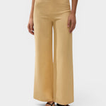 JONES + CO Syna high-rise wide-leg pants in daffodil yellow European flax linen with a smooth fitted waist.