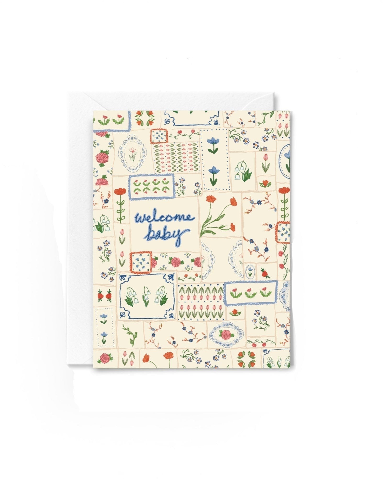 JONES + CO Welcome Baby greeting card featuring a colorful floral quilt pattern on recycled paper with an envelope.