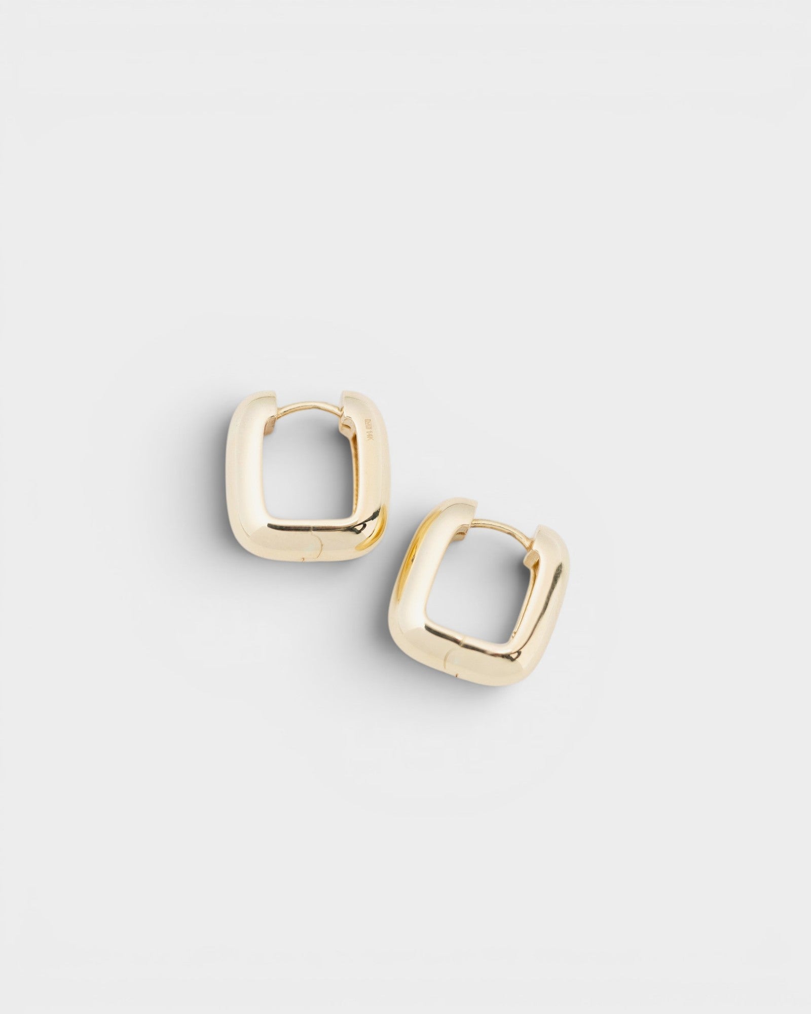 JONES + CO 14K gold chunky square tube hoop earrings with a vintage cool design.
