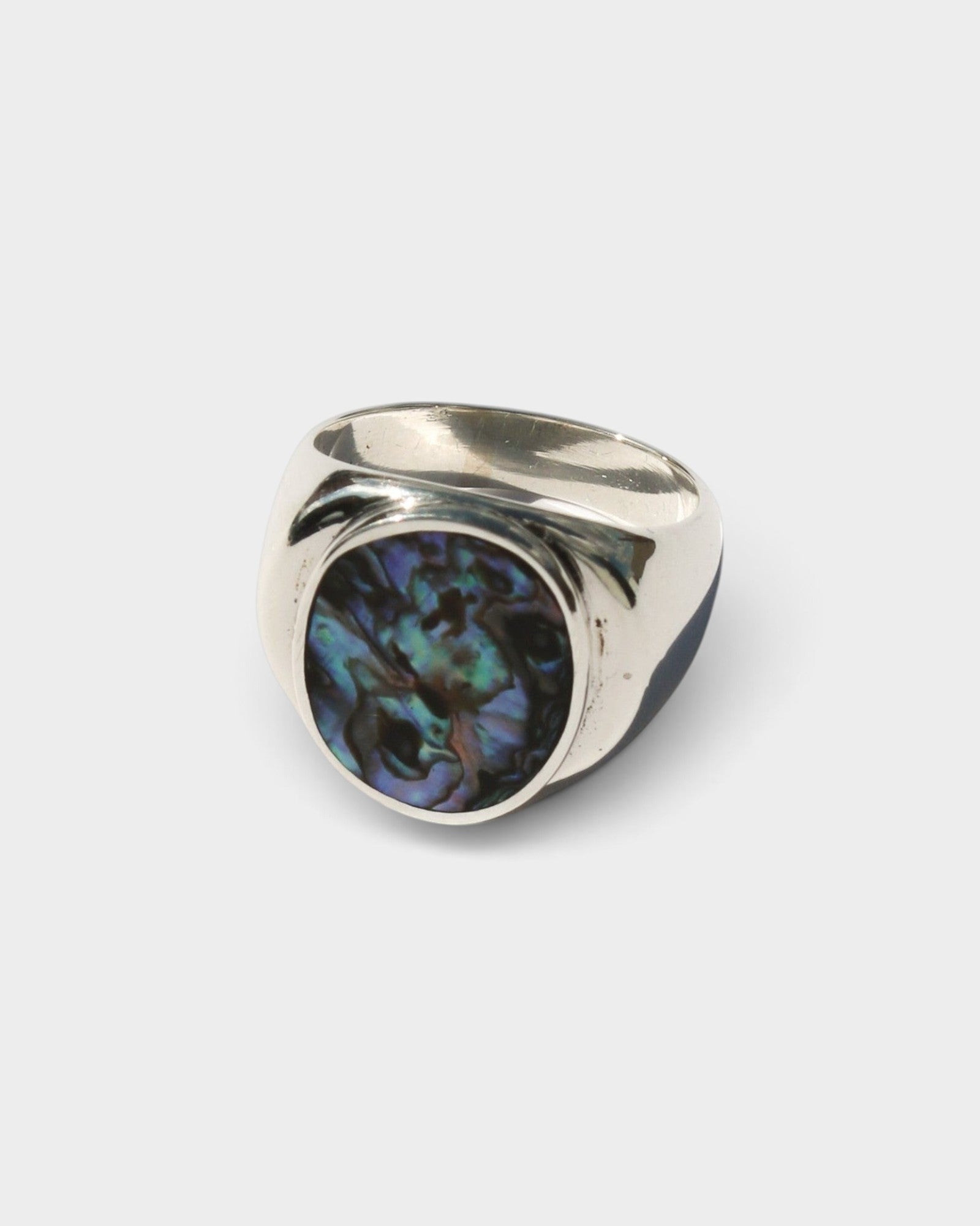 JONES + CO sterling silver statement ring featuring a unique blue abalone shell inlay, handmade in Taxco, Mexico.