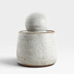 JONES + CO alabaster matte glaze stoneware stash jar with chunky knob lid. Handmade speckled ceramic.