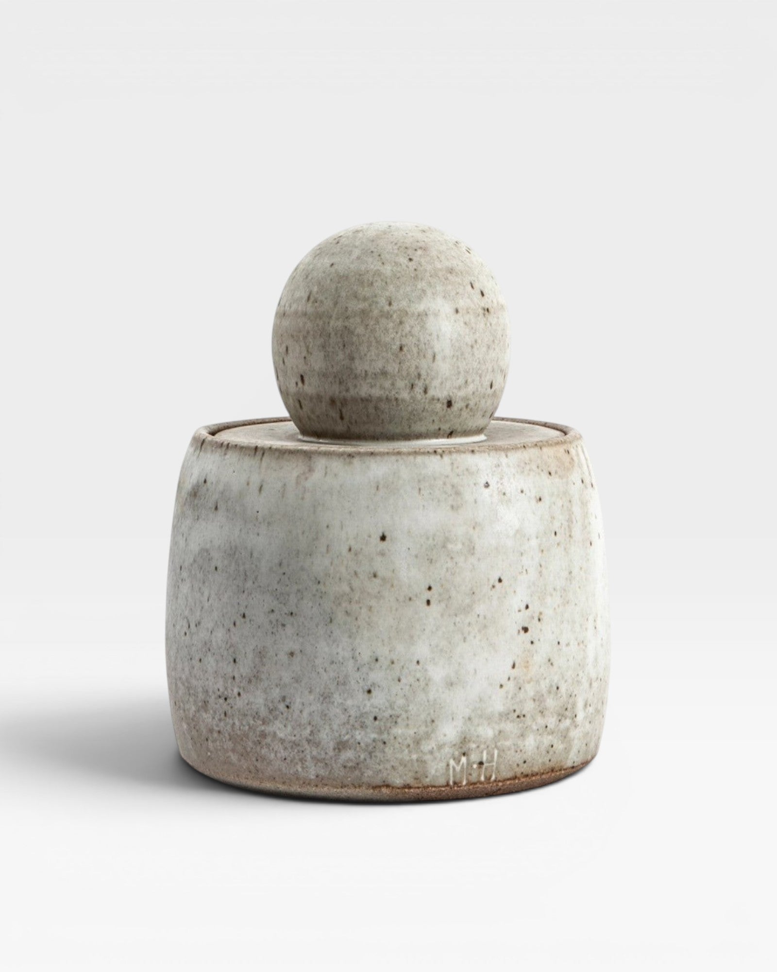 JONES + CO alabaster stoneware stash jar with a chunky knob and matte glaze. Handmade, unique piece.
