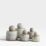 JONES + CO hand-thrown alabaster stoneware stash jars with matte glaze and chunky knobs. Set of 6.